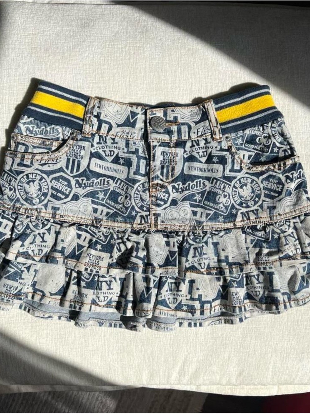LIZ LISA Blue Graphic Ruffled Denim Mini Skirt with Yellow-Striped Waistband
